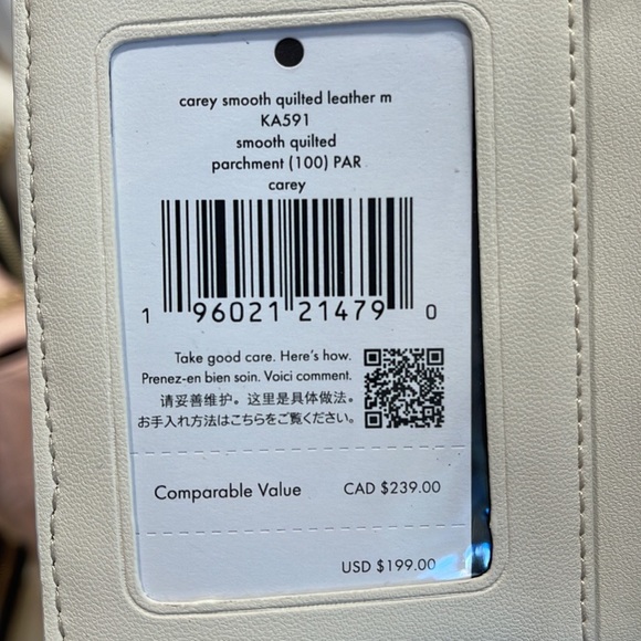 Kate Spade Carey Medium Compartment Bifold Wallet 
COLOR: Parchment - Picture 10 of 16